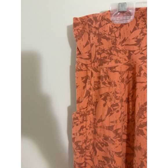 R.E.I Co-op leggings Peach colored geometric print pockets size Medium - Picture 4 of 5